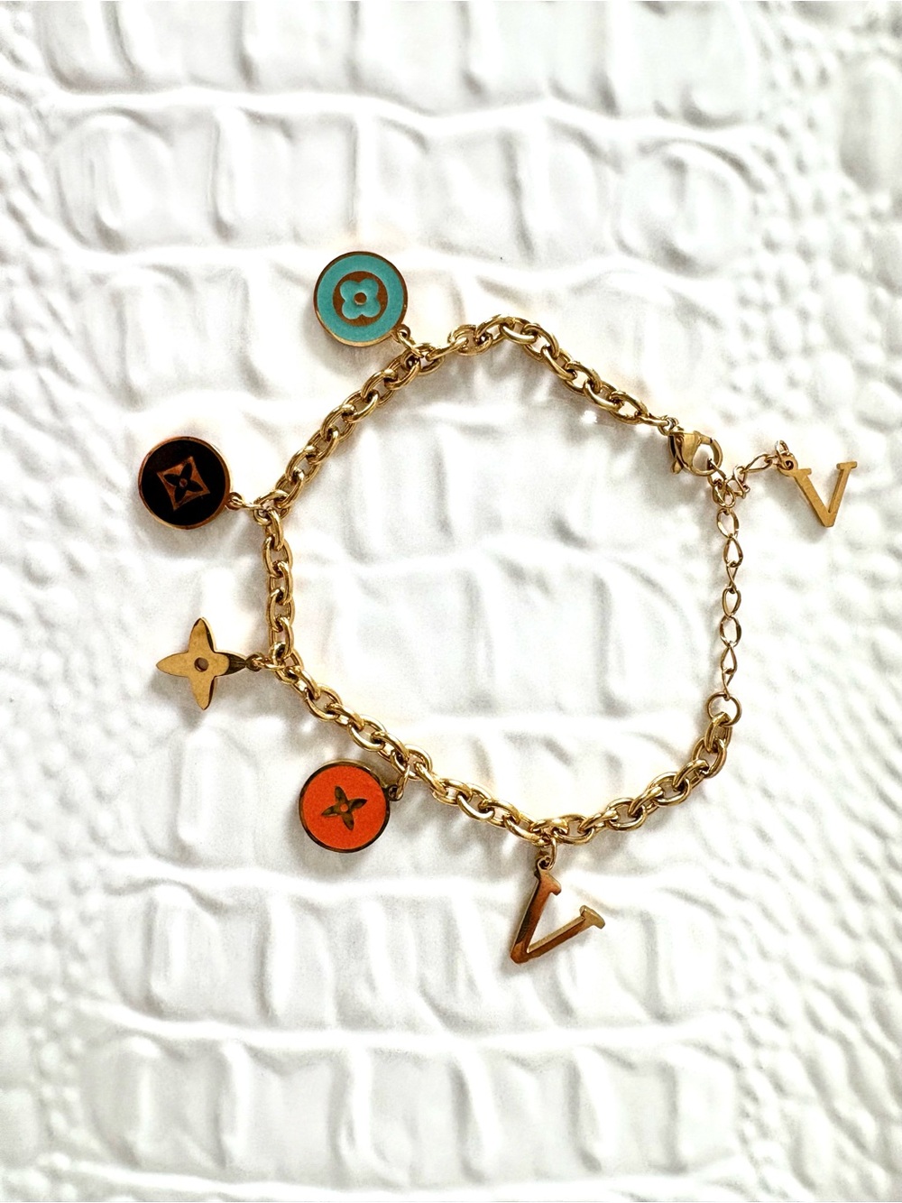 Charm Bracelet designer inspired with adjustable wrist.  Like new !